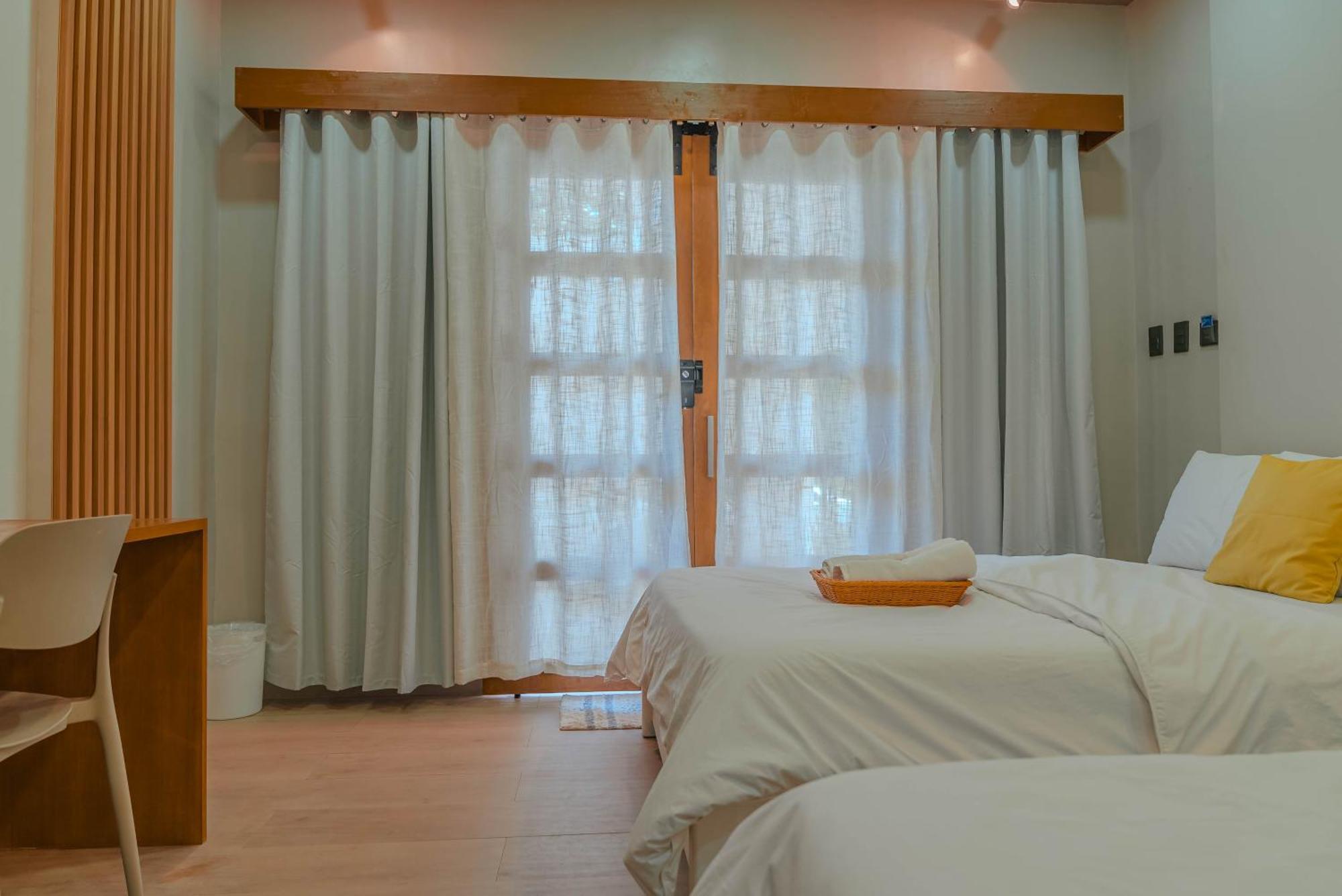 GT Seaside Inn Oslob Quarto foto